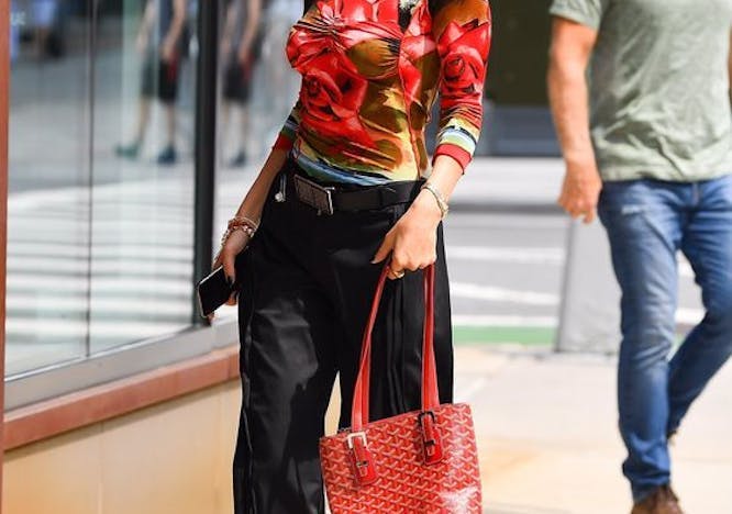 person shoe clothing handbag accessories bag sunglasses female purse jeans