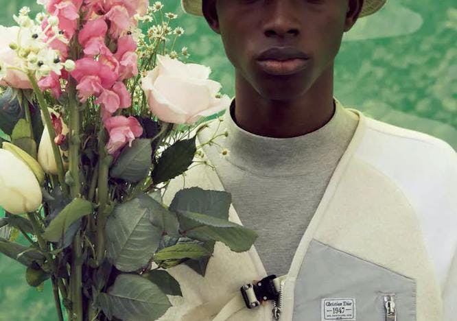 hat clothing plant person human flower blossom flower bouquet flower arrangement face
