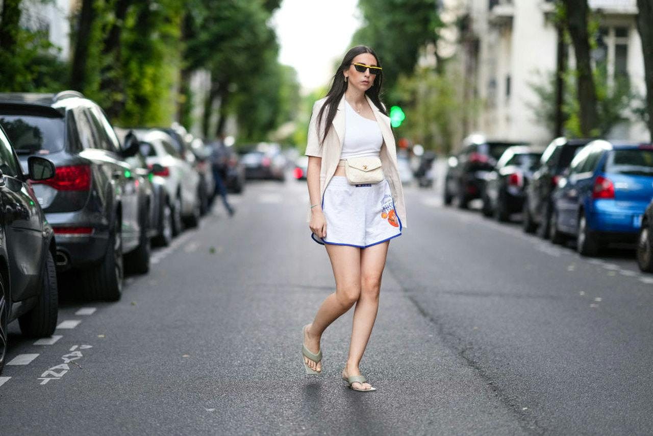 shorts clothing person car transportation sunglasses accessories skirt wheel machine
