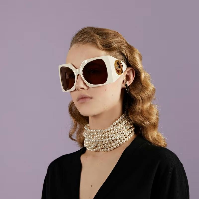 accessories sunglasses blonde hair person jewelry necklace
