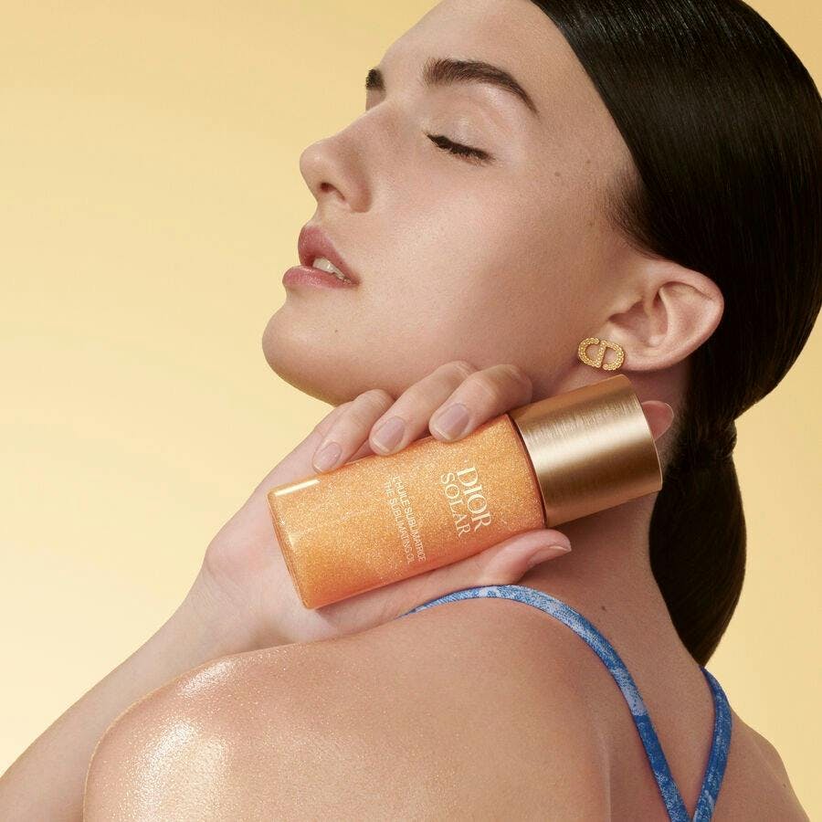 head person face body part neck cosmetics bottle perfume
