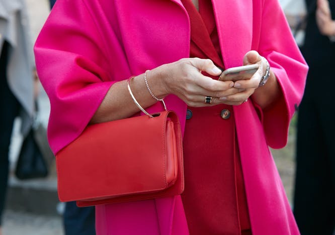 pink,smartphone,week,woman,ring,show,bag,milan,vivid,red,fuchsia,outfit,street,elegant,italy,milan fashion week,look,people,leather,outdoor,stylish,coat,luisa beccaria,luxury,style,accessory,colorful,photography,fashion clothing coat accessories bag handbag electronics mobile phone phone purse overcoat