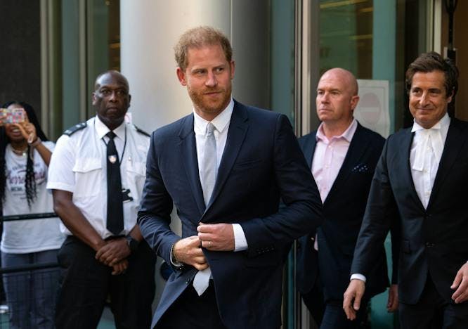london england tie suit adult male man person coat wristwatch people necklace