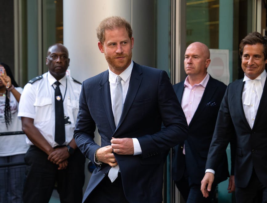 london england tie suit adult male man person coat wristwatch people necklace