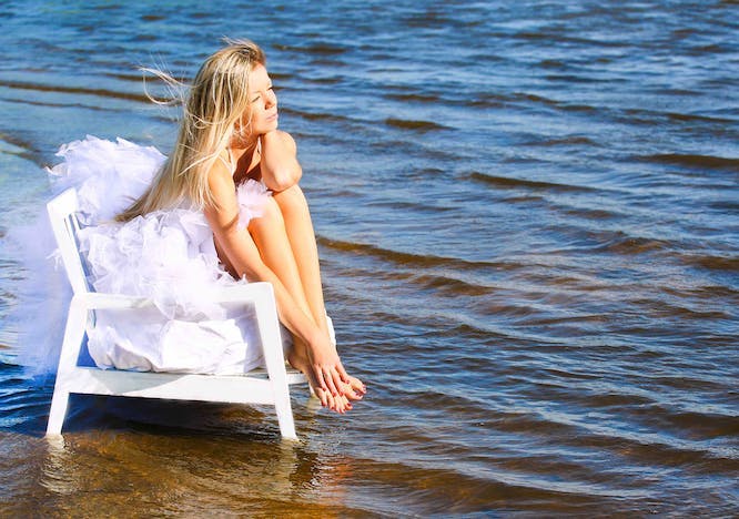 bride,love,dancing,dress,romance,woman,beauty,jumping,young,caucasian,dreams,sea,summer,beautiful,freedom,white,happiness,barefoot,wedding,female,sky,smiling,nature,one,cheerful,people,water,dancer,enjoyment,outdoors,idyllic,person,vacations,beach,sensuality,adult,travel person sitting beachwear clothing nature outdoors sea water