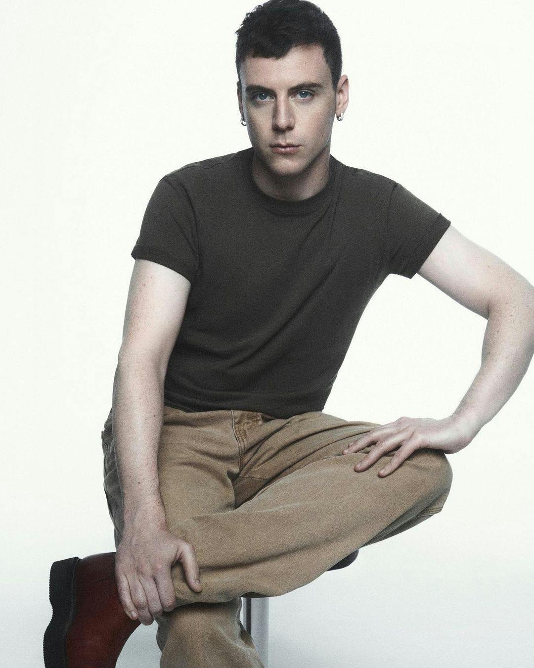 person photography portrait sitting sleeve adult male man pants t-shirt