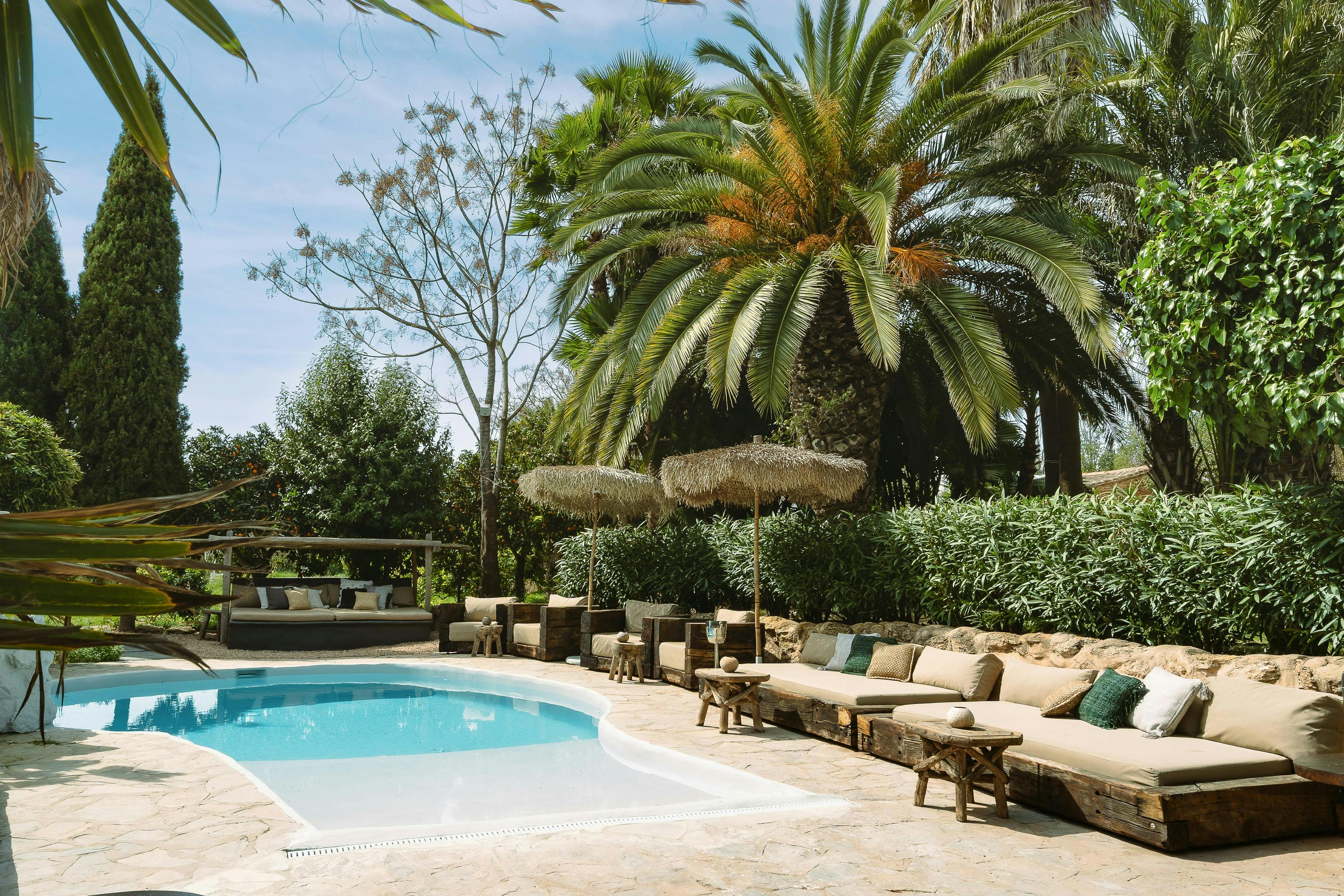 summer backyard garden hotel resort pool villa patio couch swimming pool