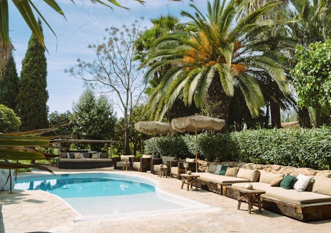 summer backyard garden hotel resort pool villa patio couch swimming pool