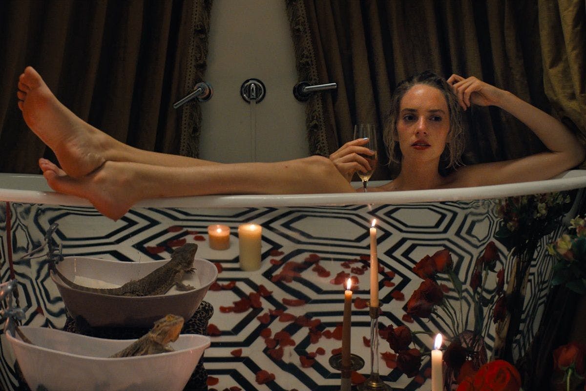 bathing bathtub person tub adult female woman face head candle