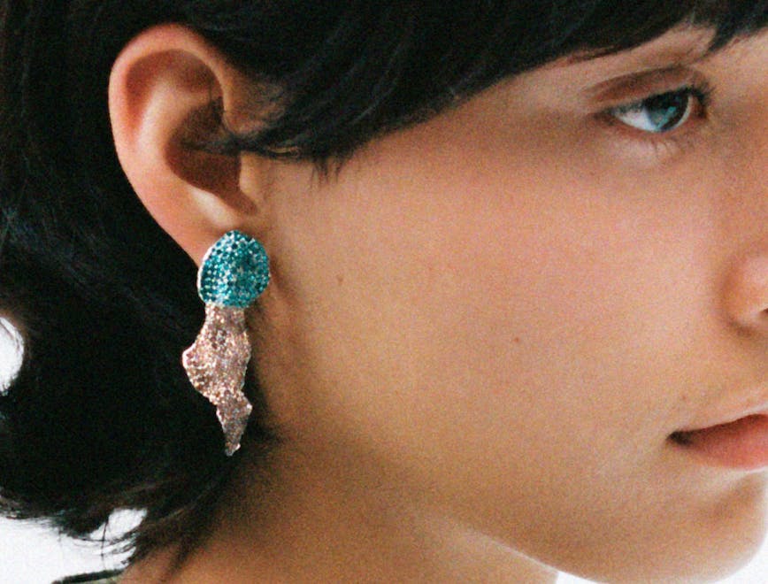 accessories earring jewelry adult female person woman face head gemstone